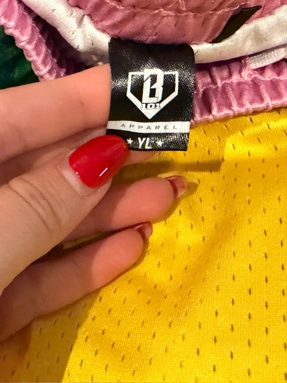 Kids Yellow Athletic Shorts with Pink Waistband and Green Trim